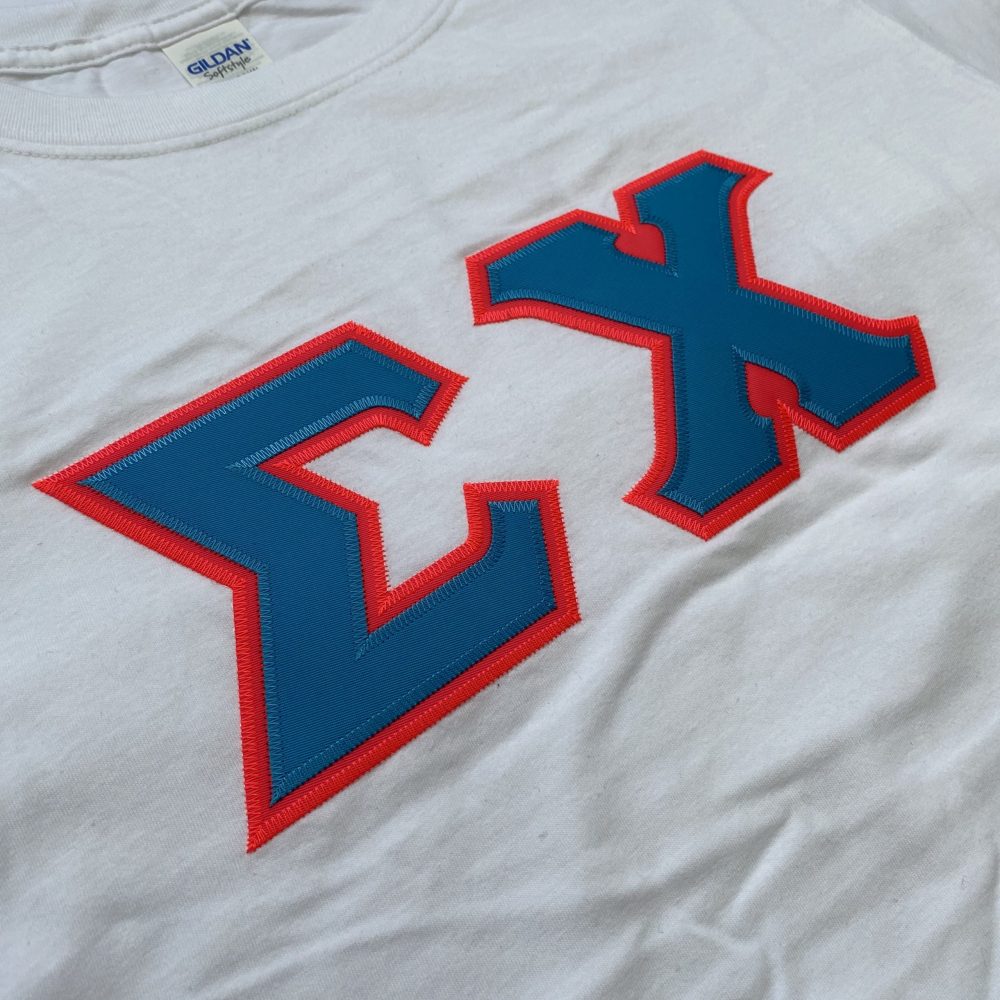 Sigma Chi Stitched Letter T-Shirt | White | Cyan with Pink Border